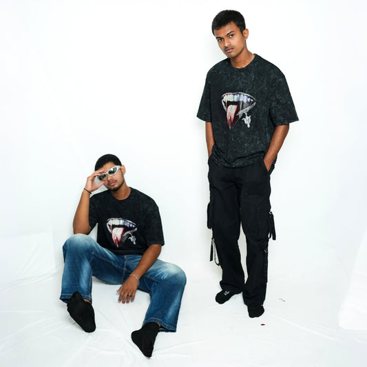 Premium TRAVIS TONGUE unisex oversized T-shirt (black acid wash)
